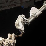 Anchored to a foot restraint, astronaut Garrett Reisman conducts a spacewalk. Good thing those restraints are well engineered!
Image Credit: NASA
