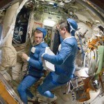 Clad in blue thermal undergarments that go with the Russian Orlan spacesuit, cosmonauts Dmitry Kondratyev (left) and Oleg Skripochka prepare to put on their spacesuits for a walk outside the space station early in 2011.
Image Credit: NASA