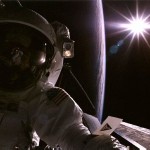 In low-Earth orbit, the atmosphere is so thin that there isn't enough of it to scatter and diffuse sunlight. So what you get up there are black shadows and dark sky, even when the sun is shining. You can see that effect in this 1997 picture as astronaut John Tanner does a spacewalk to perform some service work on the Hubble Space Telescope. If you look closely, you can see a checklist attached to Tanner's left arm.
Image Credit: NASA