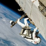 Mission specialist Piers J. Sellers moves along a truss on the International Space Station during the his mission's final session of extravehicular activity. Space Shuttle Discovery was docked with the station at the time.
Image Credit: NASA