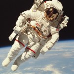 Imagine being out in space, untethered to anything...sound pretty cool? Actually, most spacewalks keep astronauts tethered to the ship. Image Credit: PhotoLink/Getty Images