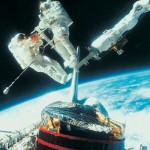 Astronauts show their lighter side by sporting a For Sale sign as they recapture a communications spacecraft.
Image Credit: Digital Vision/Getty Images