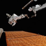Mission Specialist Scott Parazynski checks out his repair work on the fully deployed solar array of the International Space Station. Next, see the different ways astronauts stay attached to their ships.
Image Credit: NASA - digital version copyright Science Faction/Getty Images